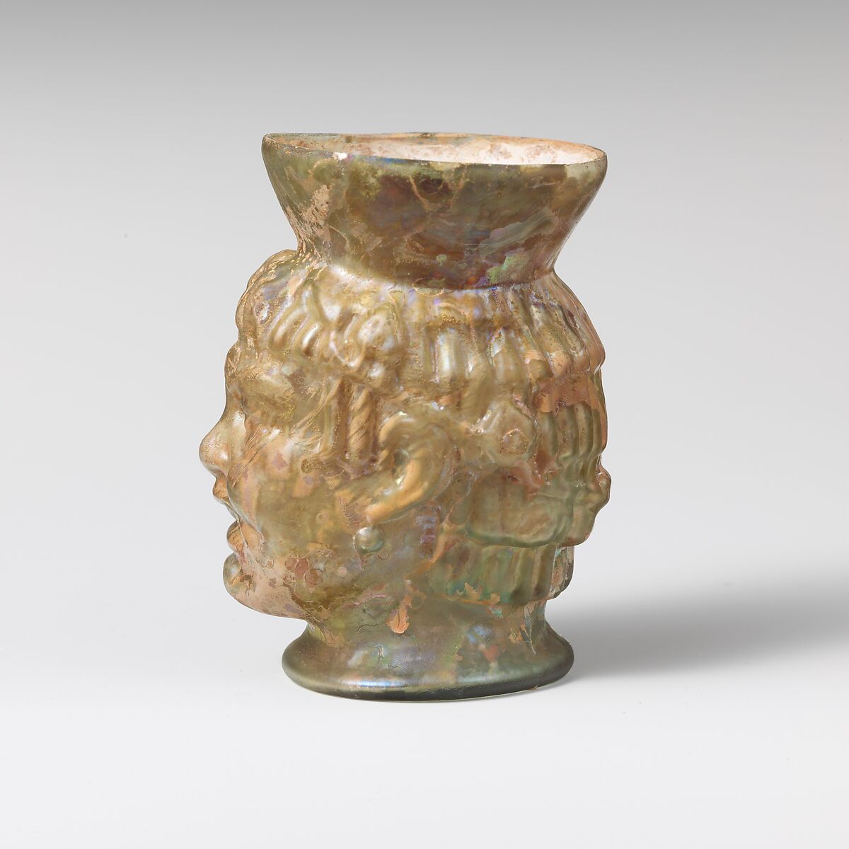 Glass cup in the shape of a Black African's head, Glass, Roman