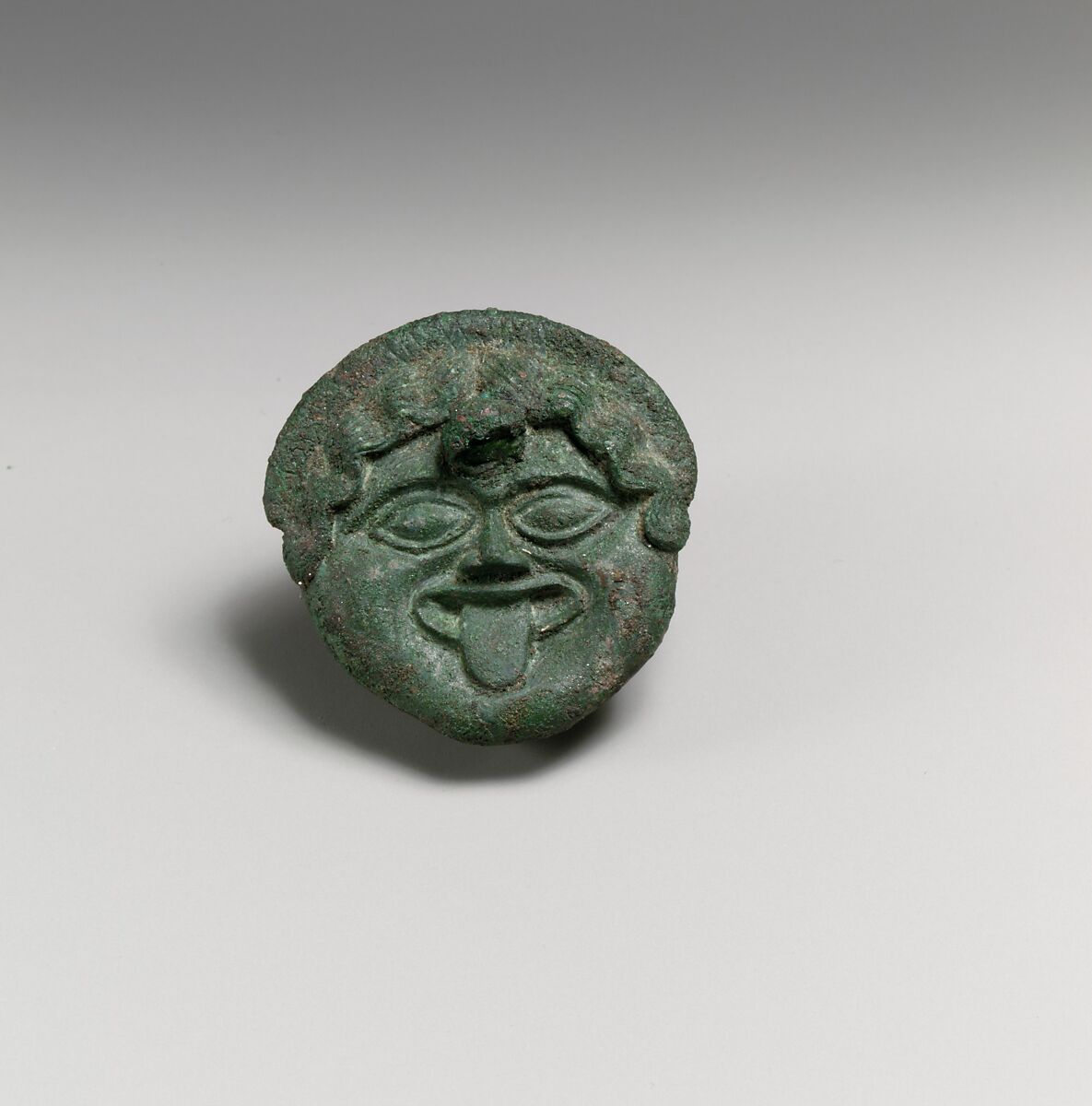 Fragments of a cart or chariot, sockets with Medusa masks, Bronze, Etruscan