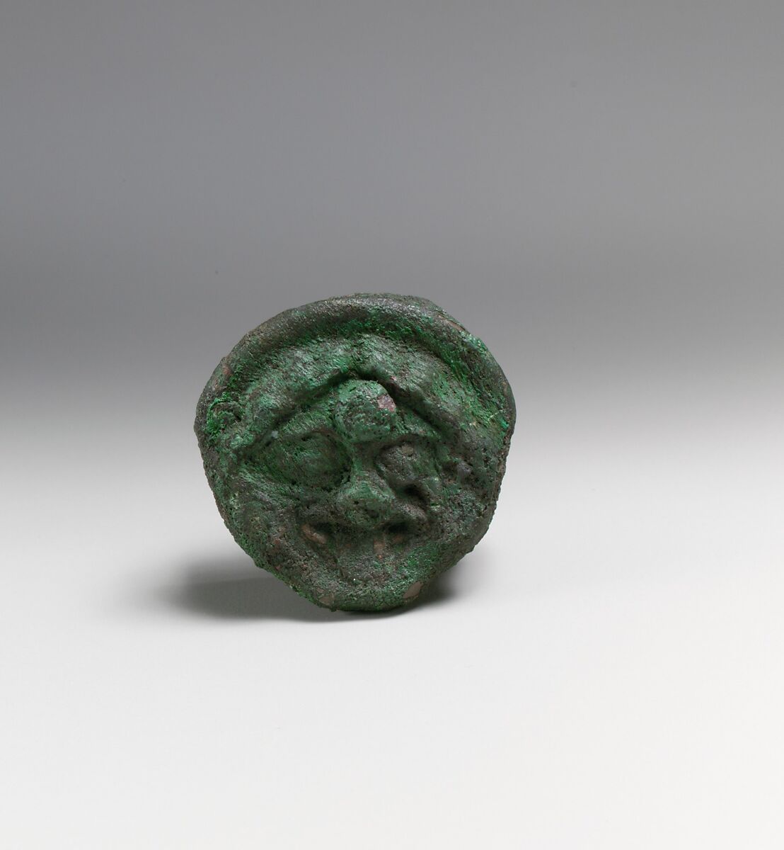 Fragments of a cart or chariot, sockets with Medusa masks, Bronze, Etruscan