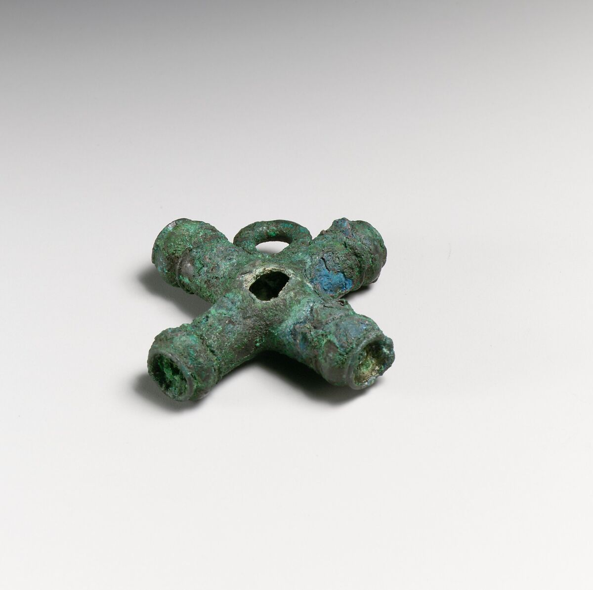 Fragments of a cart or chariot, crossed cylinders, Bronze, Etruscan