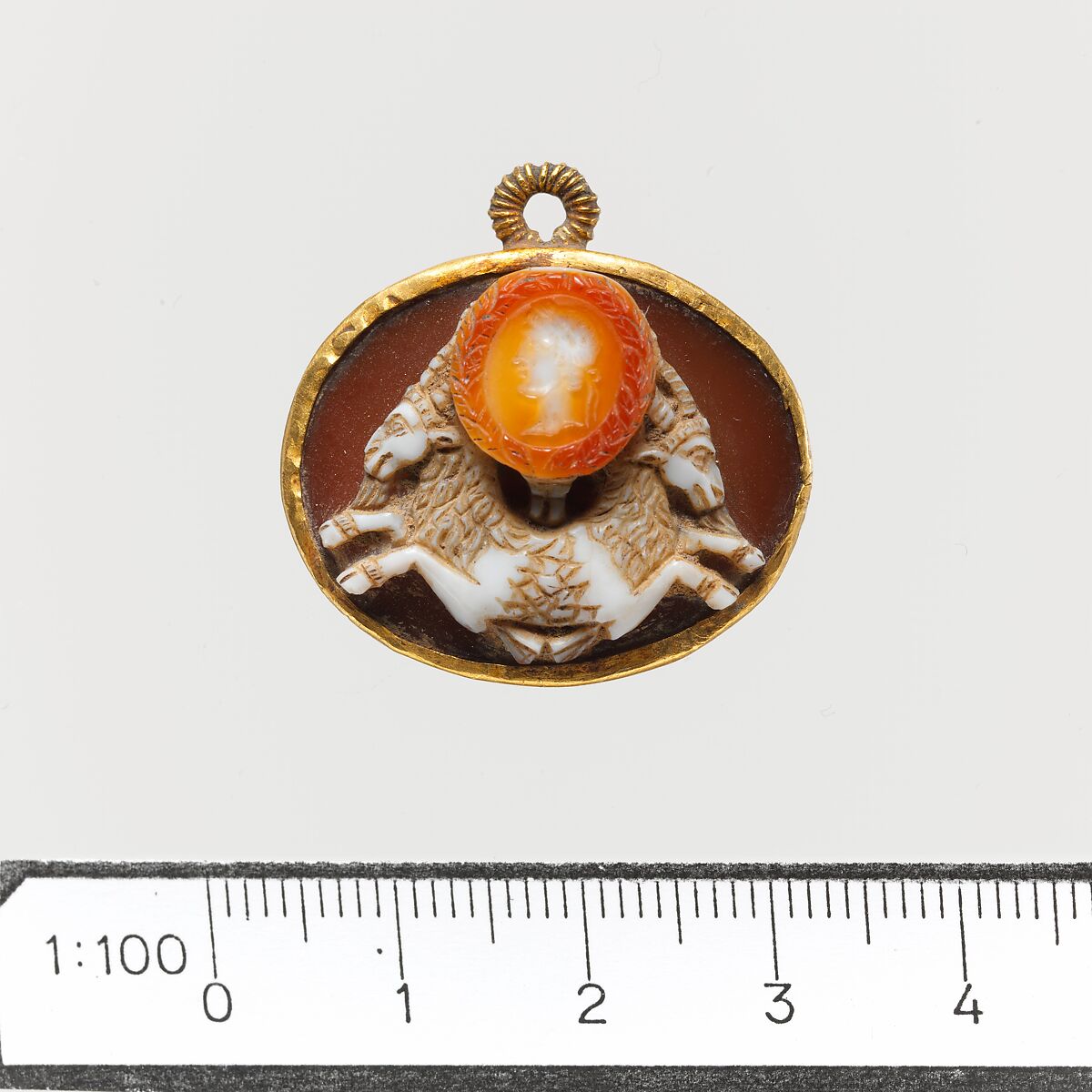 Sardonyx cameo of a double capricorn with a portrait of the emperor Augustus, Sardonyx, gold, Roman