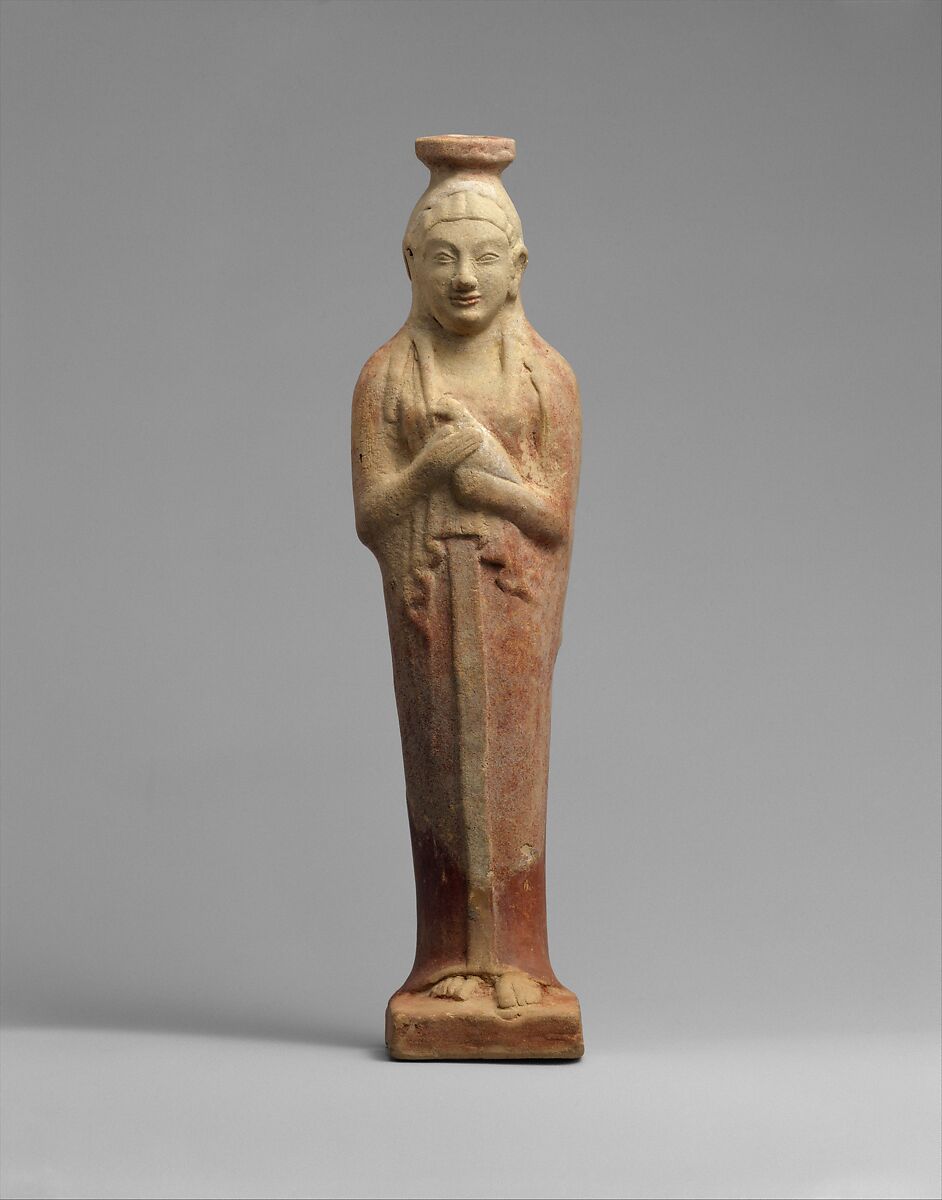 Terracotta alabastron (perfume vase) in the form of a woman holding a dove, Terracotta, East Greek 