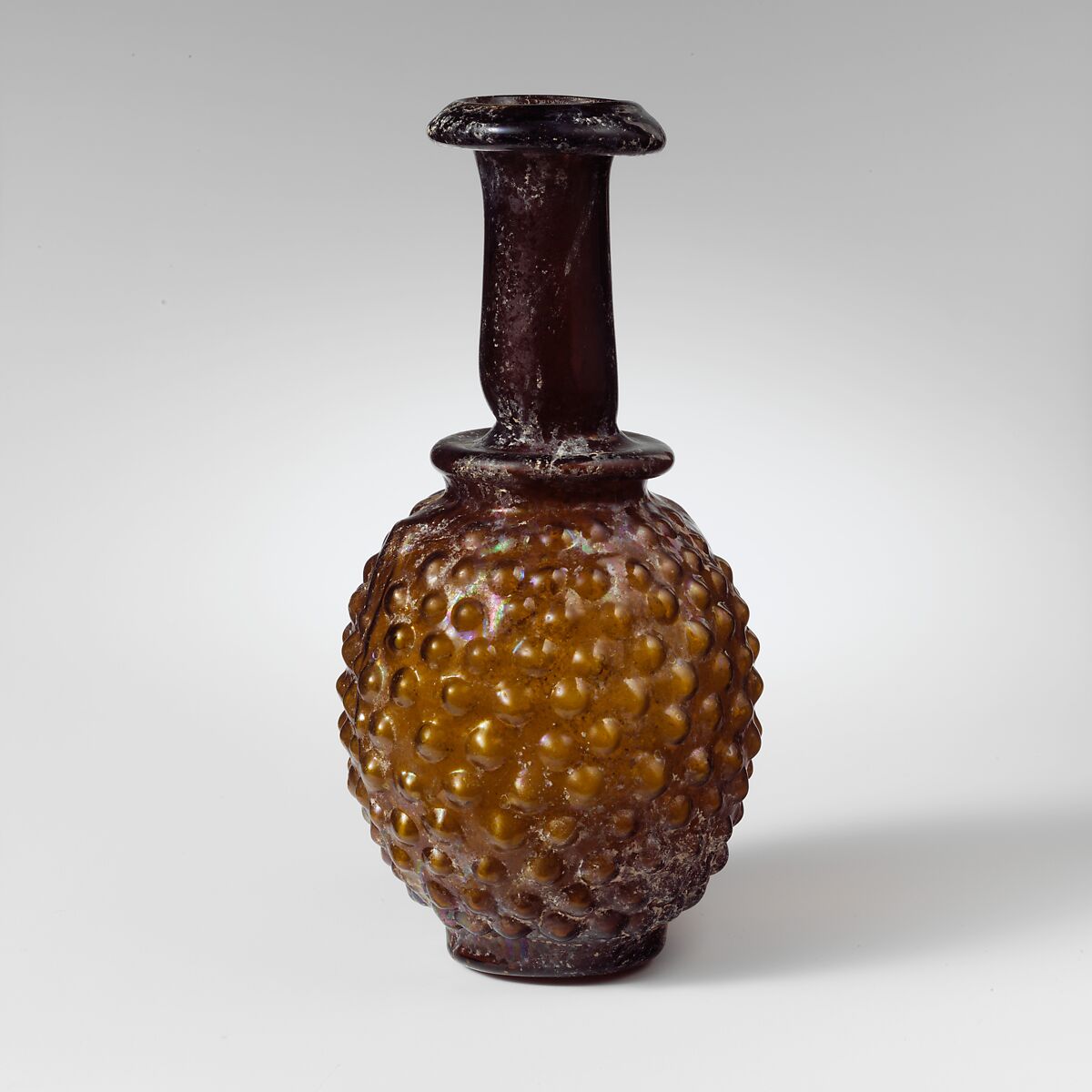 Glass bottle shaped like a bunch of grapes, Glass, Roman, Syrian 