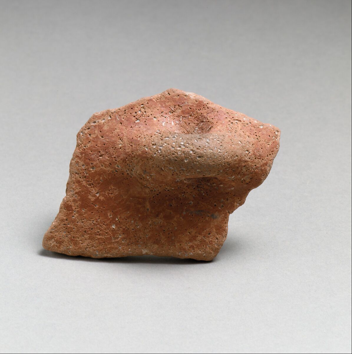 Terracotta rim fragment with horizontal rolled handle, Terracotta, Greek Neolithic 