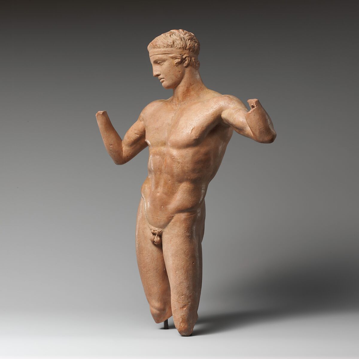 Terracotta statuette of the Diadoumenos (youth tying a fillet around his head), Terracotta, Greek