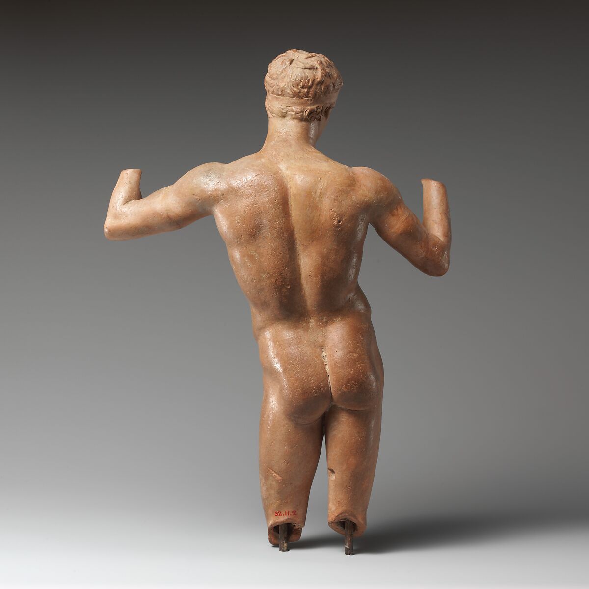Terracotta statuette of the Diadoumenos (youth tying a fillet around his head), Terracotta, Greek