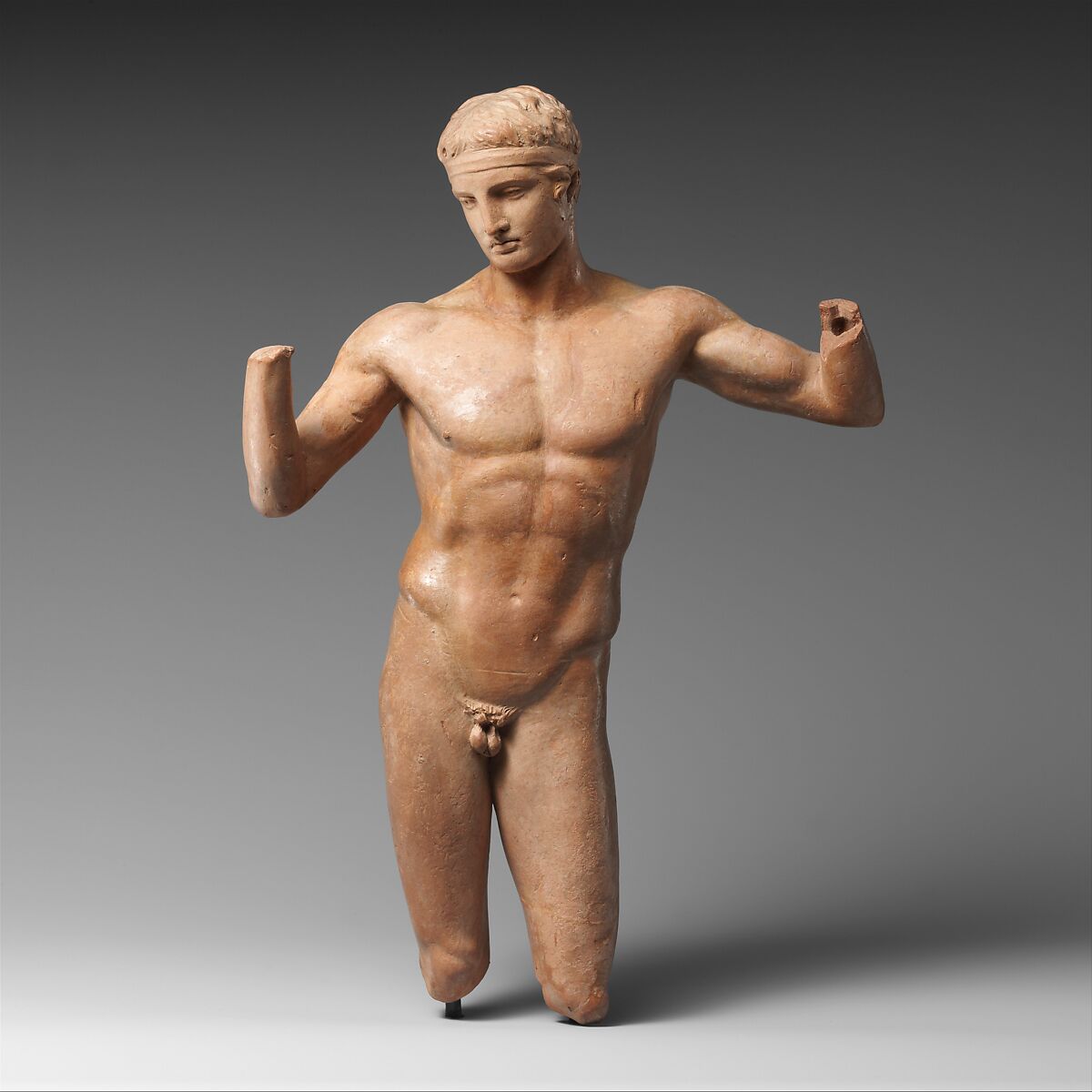 Terracotta statuette of the Diadoumenos (youth tying a fillet around his head), Terracotta, Greek 