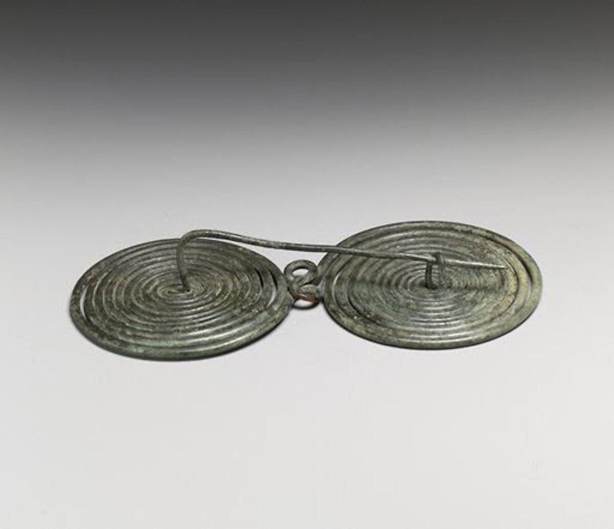 Bronze spectacle fibula (safety pin), Bronze, Italic 