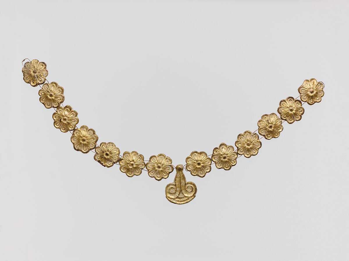 Gilt terracotta ornaments from a necklace, Terracotta, gold, Mycenaean 