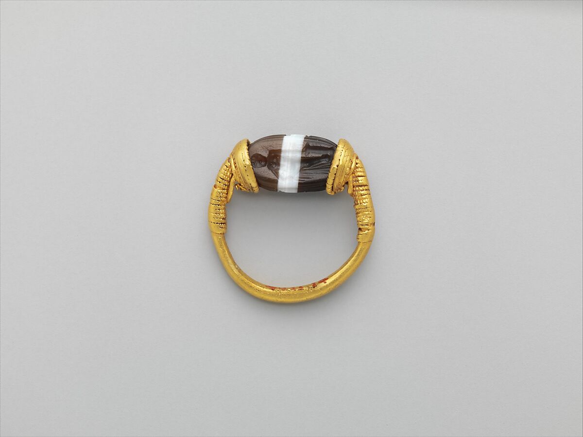 Gold and banded carnelian ring: on scarab bezel, a youth - Etruscan ...