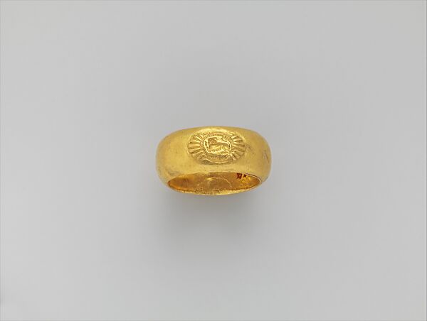 Gold ring: on bezel, lion