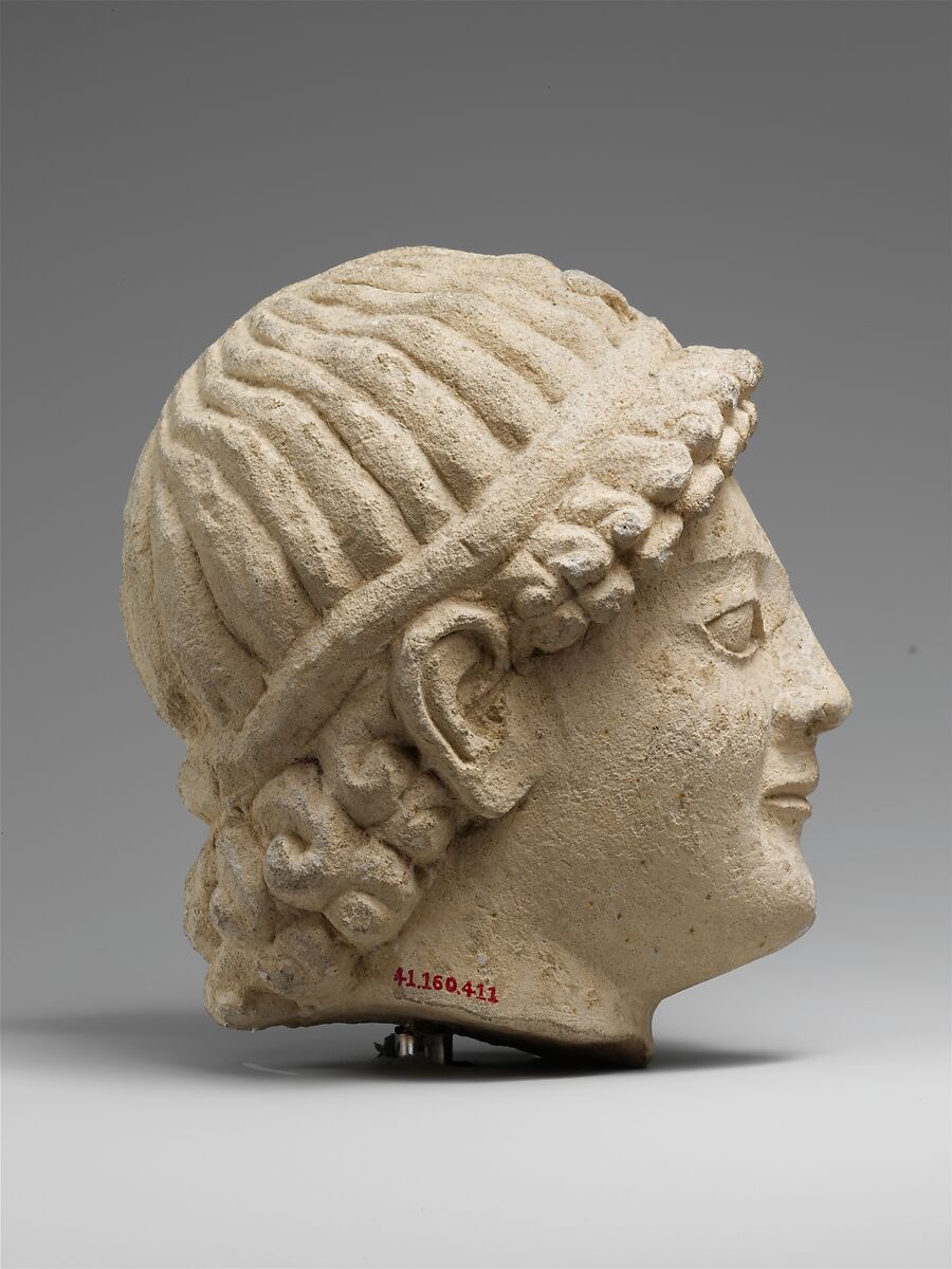Limestone head of a wreathed youth, Limestone, Cypriot