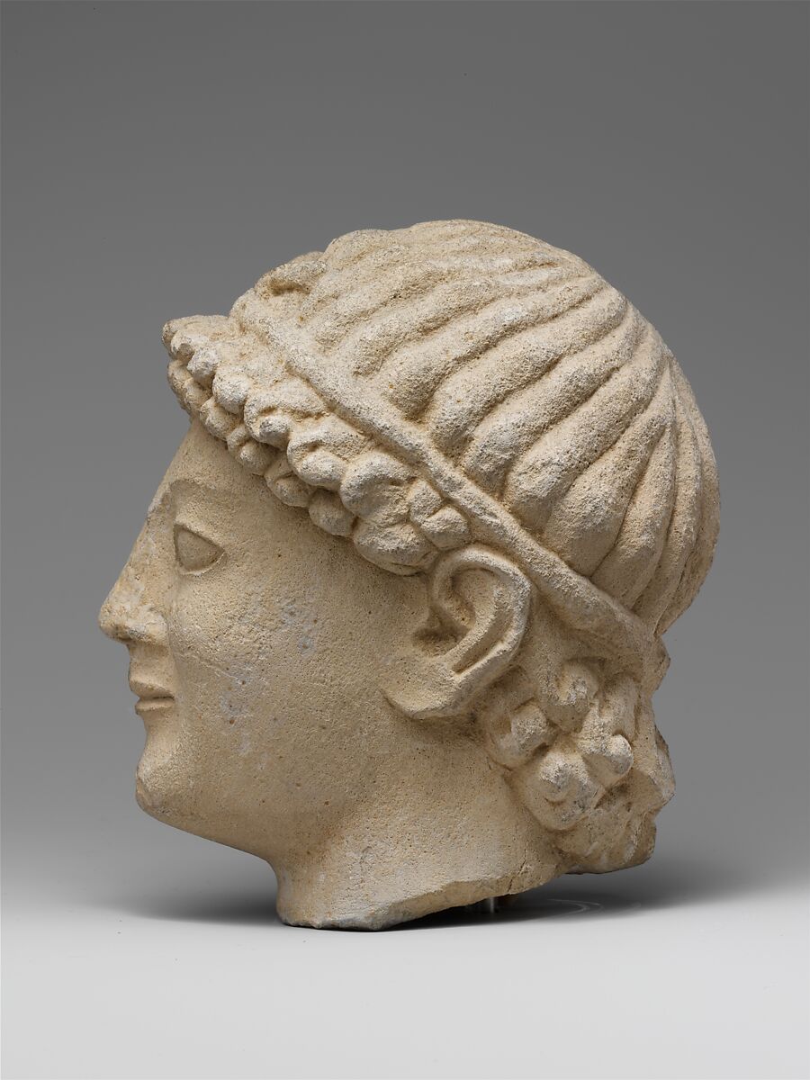 Limestone head of a wreathed youth, Limestone, Cypriot