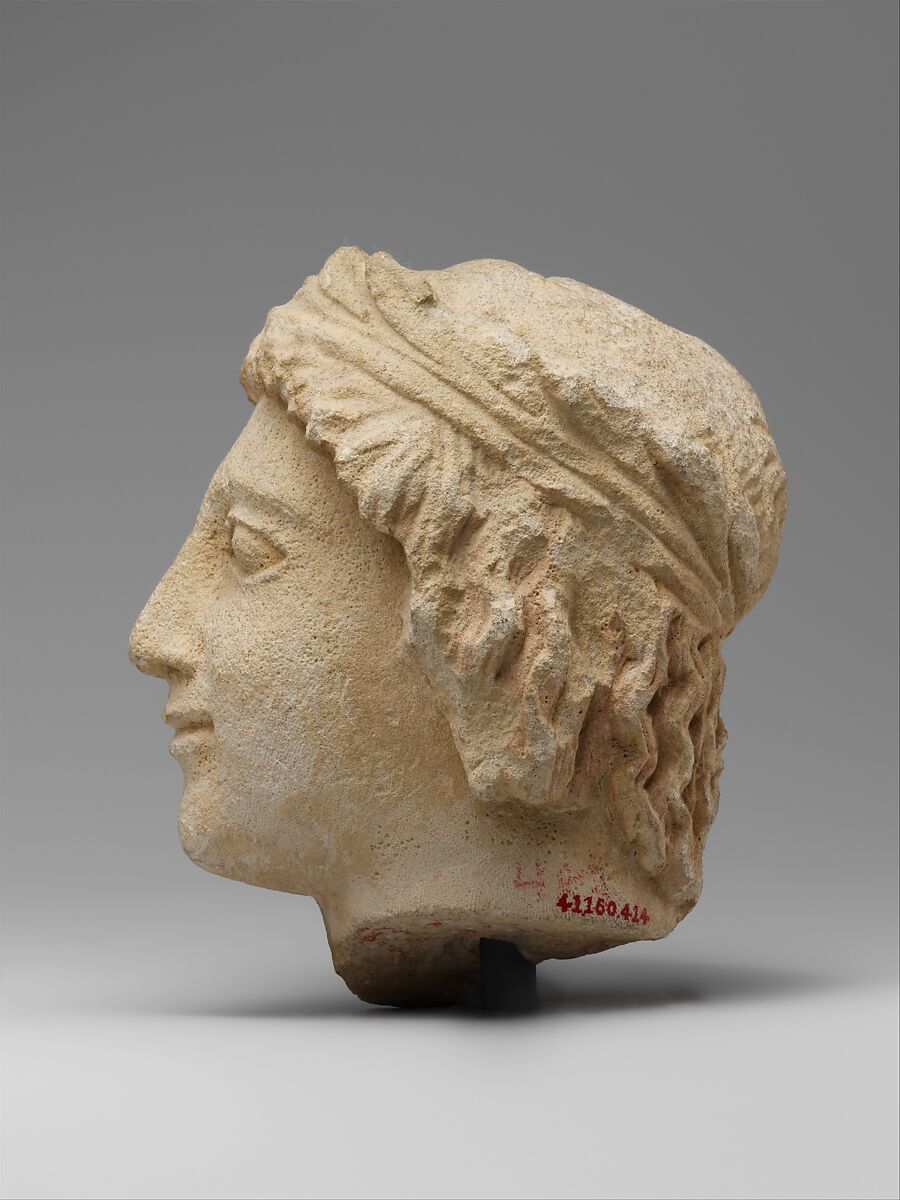 Limestone head of a wreathed youth, Limestone, Cypriot