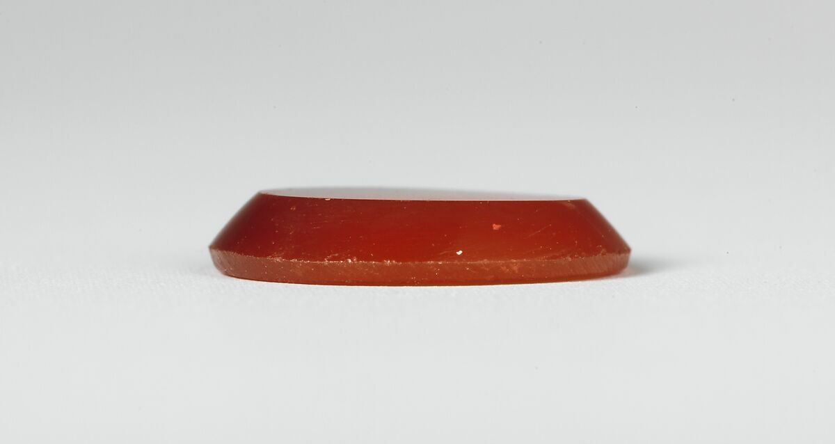 Carnelian intaglio: Standing Anubis, Carnelian, Roman