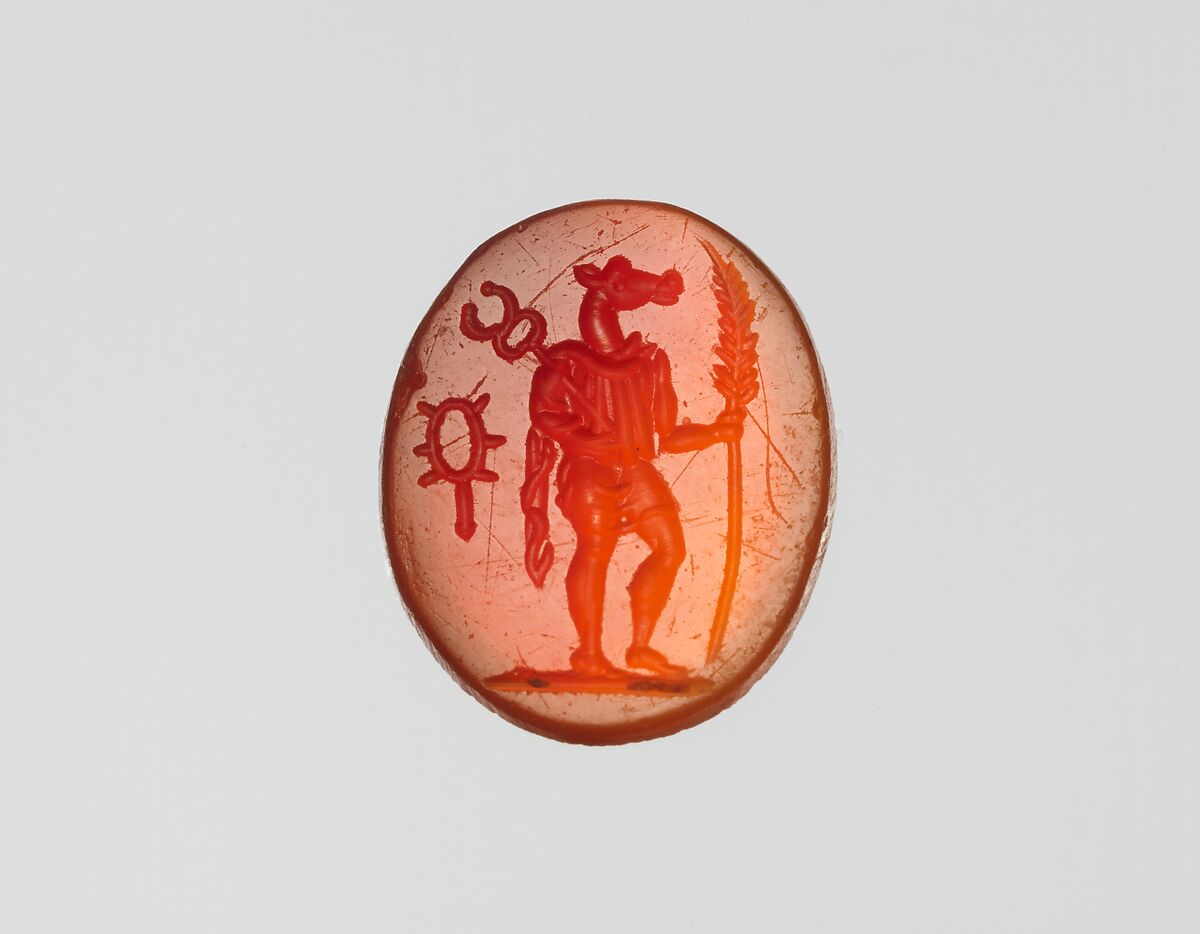 Carnelian intaglio: Standing Anubis, Carnelian, Roman 