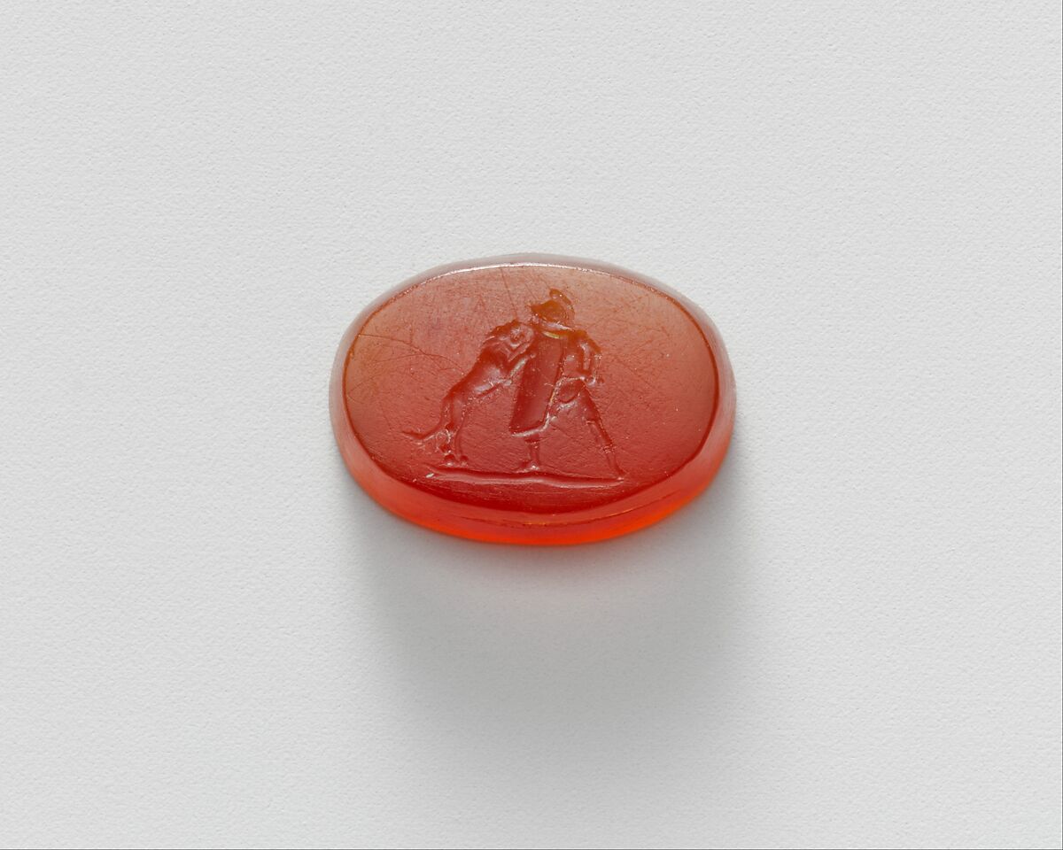 Carnelian intaglio of a gladiator fighting a lion