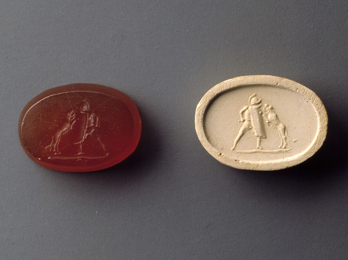 Carnelian intaglio of a gladiator fighting a lion, Carnelian, Roman