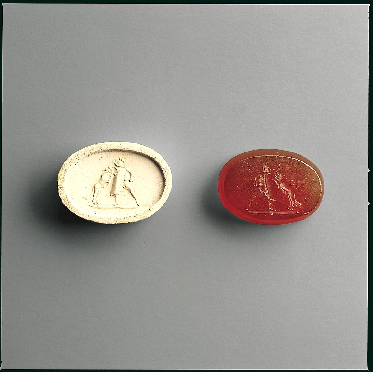 Carnelian intaglio of a gladiator fighting a lion, Carnelian, Roman