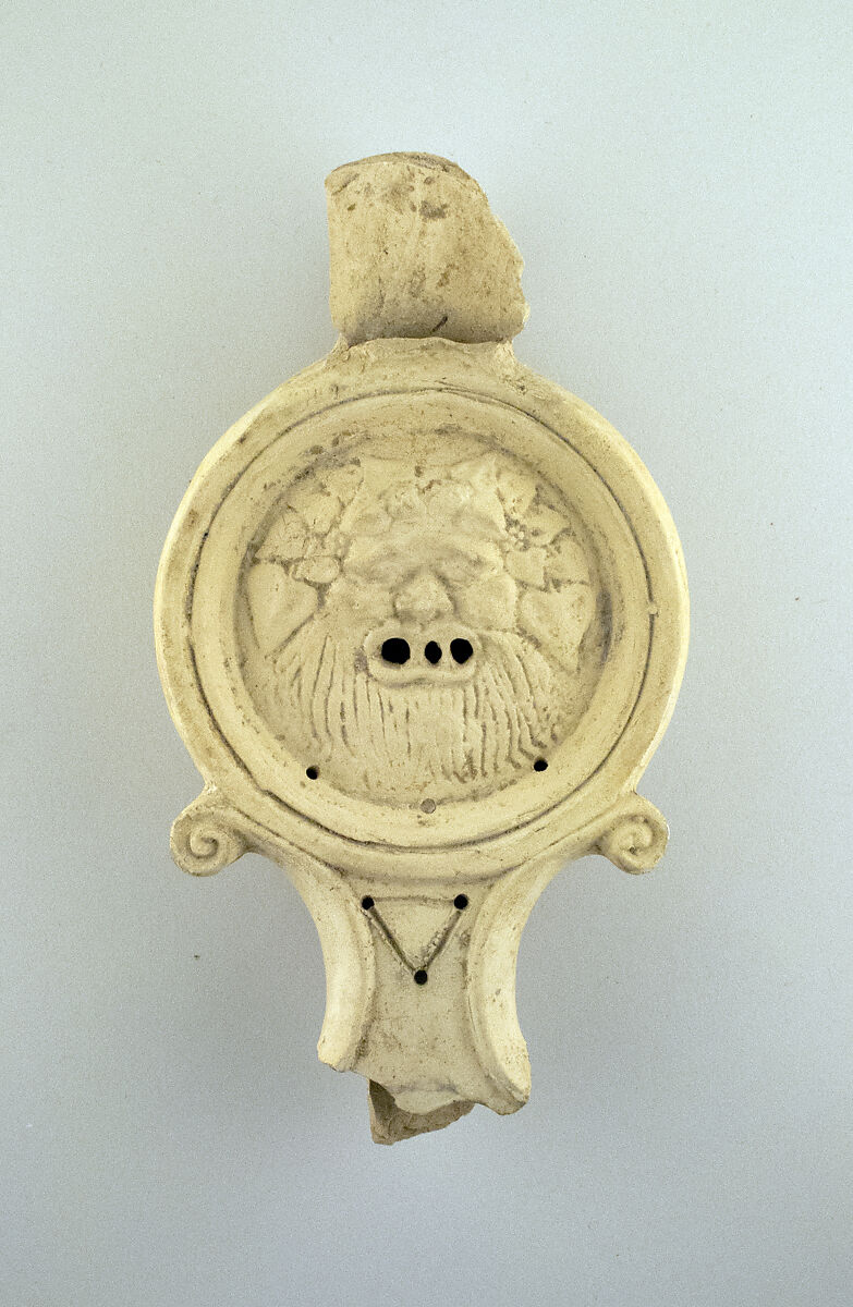 Terracotta lamp in the form of a satyr's mask, Terracotta 