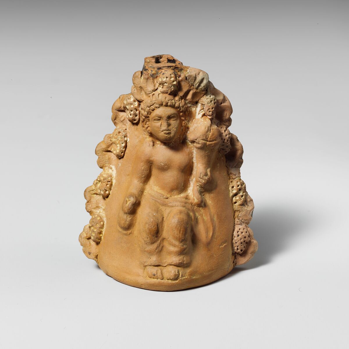 Terracotta oinochoe (jug) with a seated boy, Terracotta, Greek, Attic 
