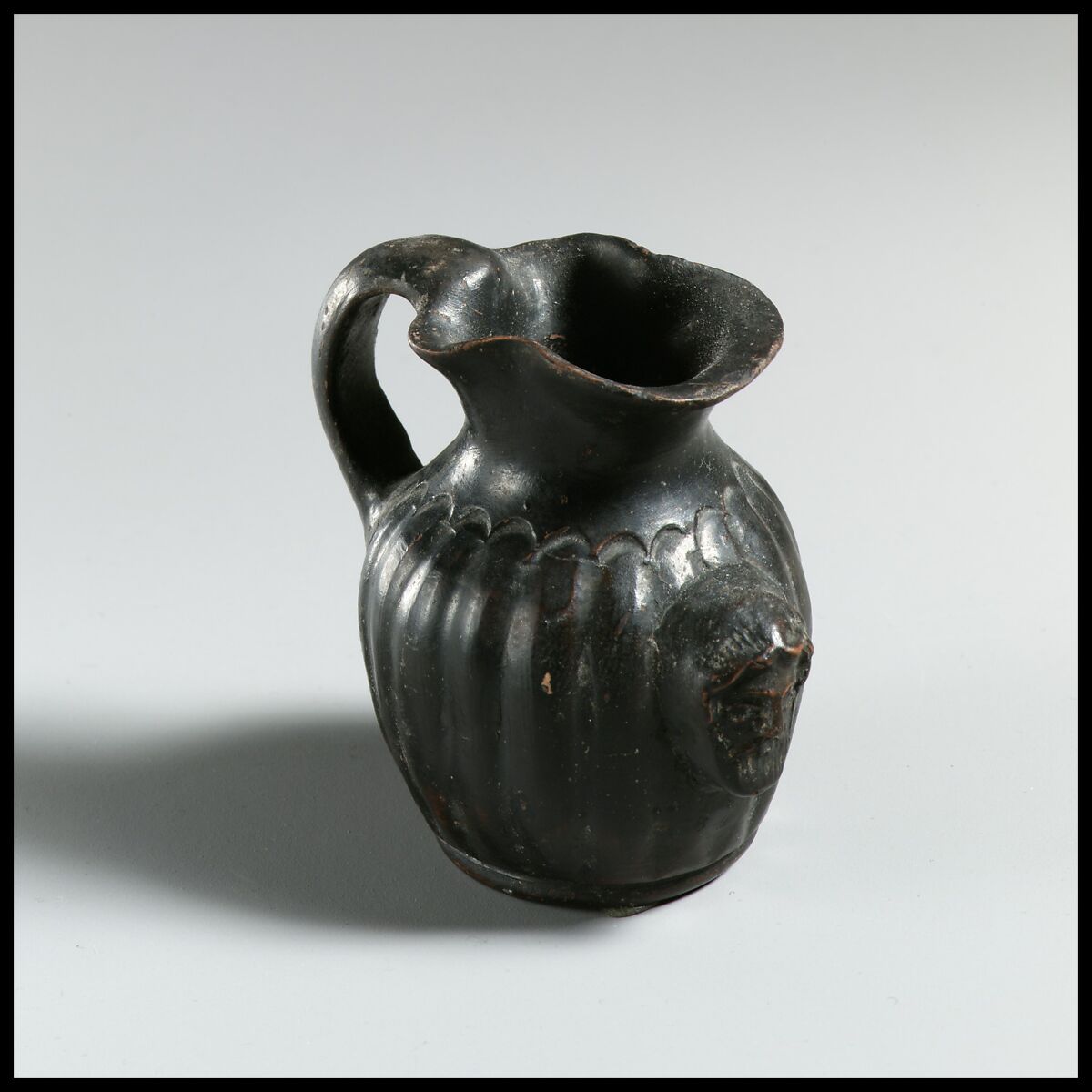 Terracotta miniature oinochoe (jug), Terracotta, Greek, South Italian, Campanian 