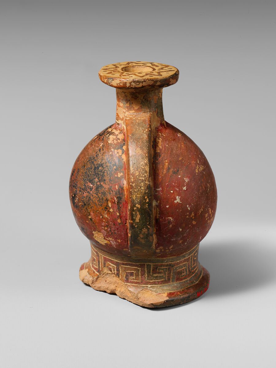 Terracotta aryballos in the form of a helmeted head, Terracotta, East Greek