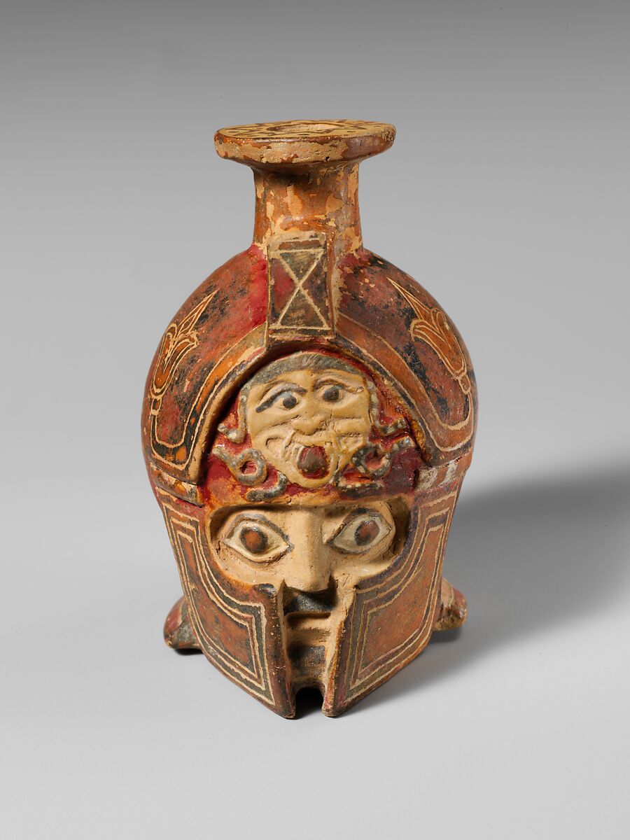 Terracotta aryballos in the form of a helmeted head