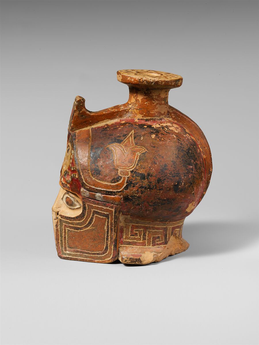 Terracotta aryballos in the form of a helmeted head, Terracotta, East Greek