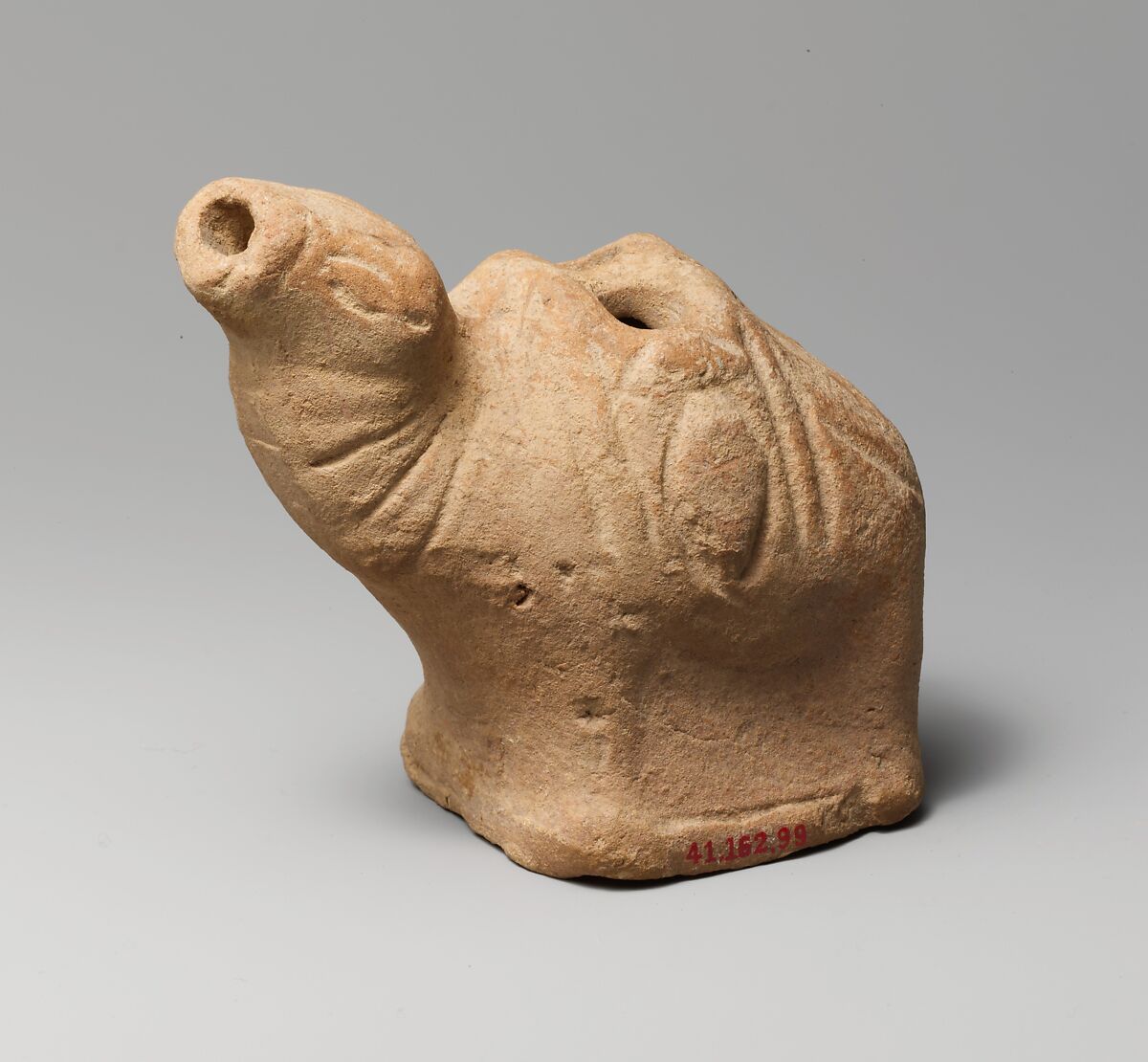 Terracotta lamp in the form of a camel, Terracotta, Greek or Roman 