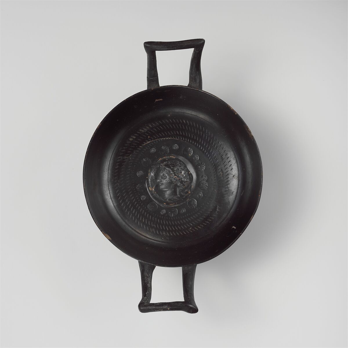 Terracotta stemless kylix (drinking cup), Terracotta, Greek, South Italian, Campanian, Calenian 