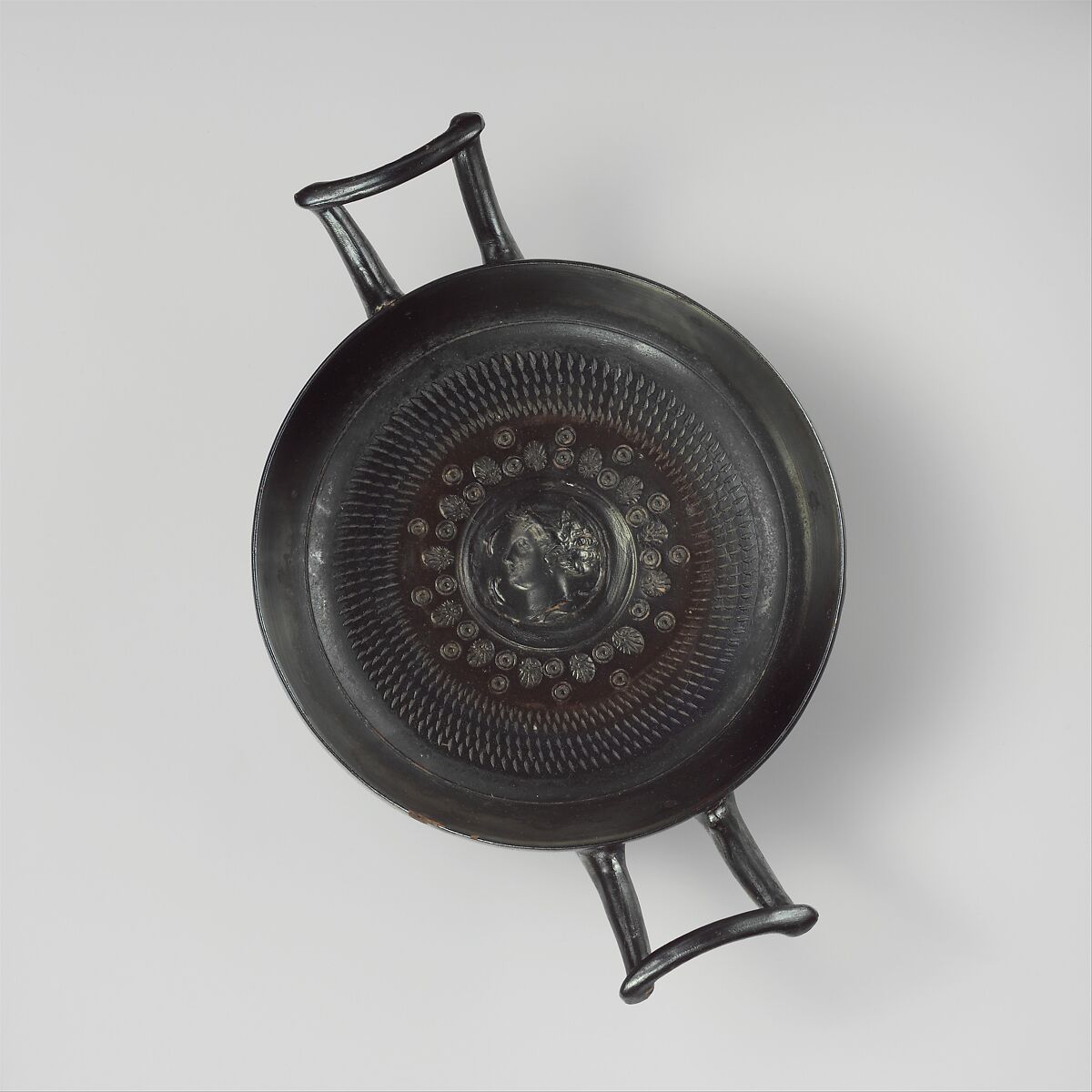 Terracotta stemless kylix (drinking cup), Terracotta, Greek, South Italian, Campanian, Calenian 