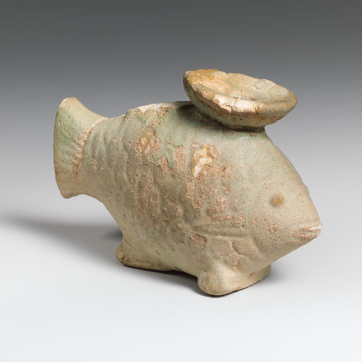Faience aryballos (oil flask) in the form of a fish, Faience, East Greek 