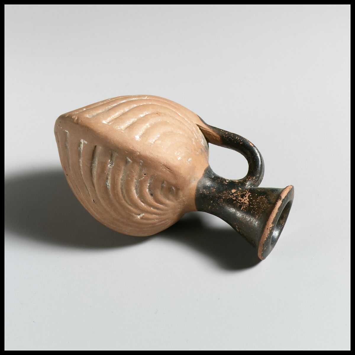 Terracotta vase in the form of two cockle shells, Terracotta, Greek, Attic 