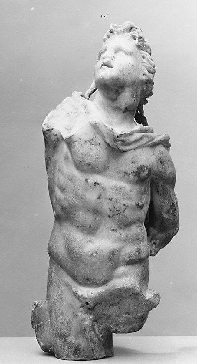 Marble statuette of a male figure with shaggy hair, Marble, Pentelic ?, Roman 