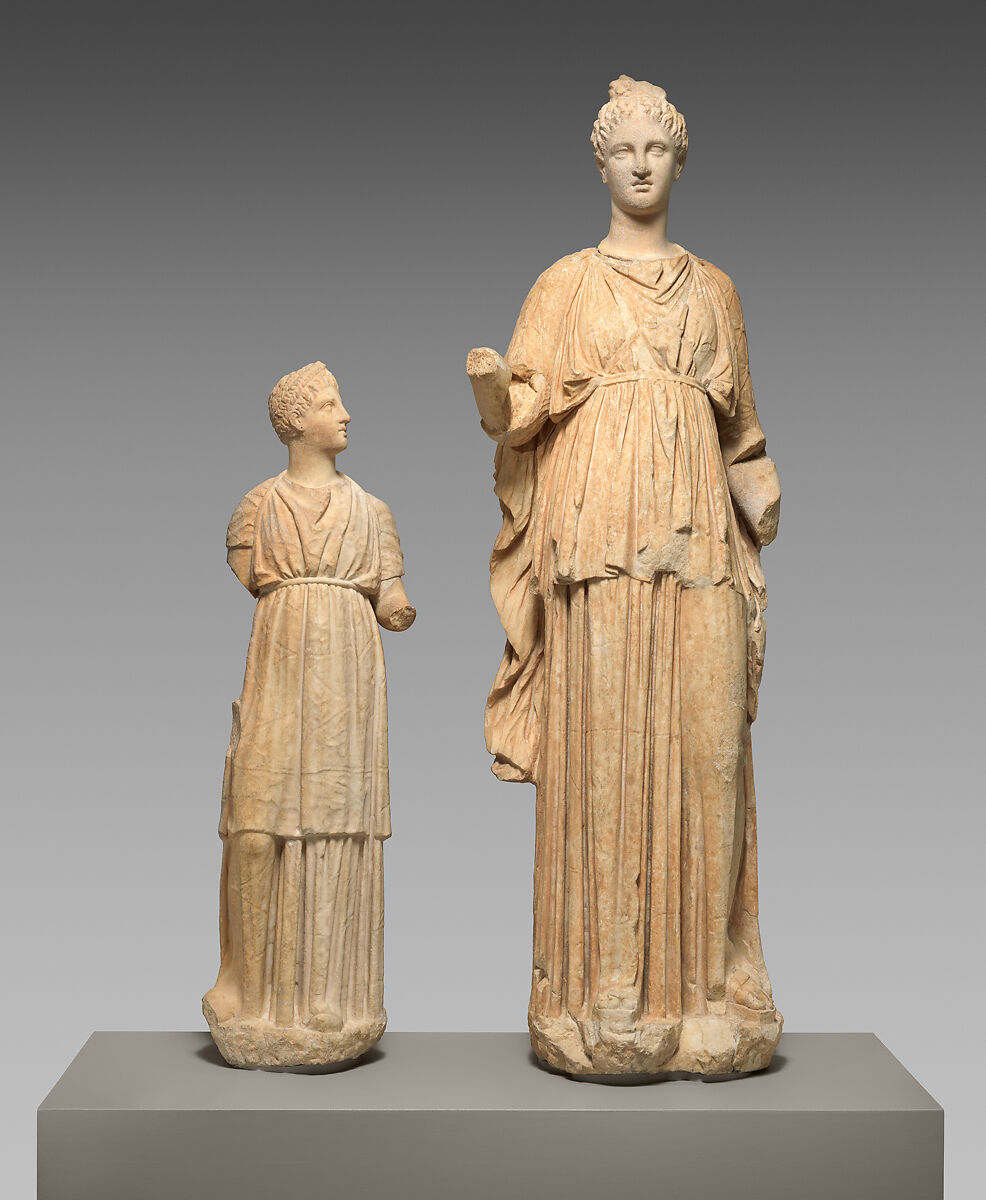 Marble funerary statues of a maiden and a little girl