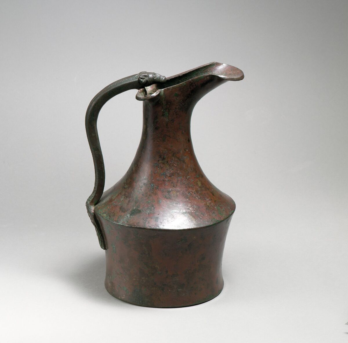 Bronze oinochoe (jug) and handle attachment, Bronze, Etruscan 