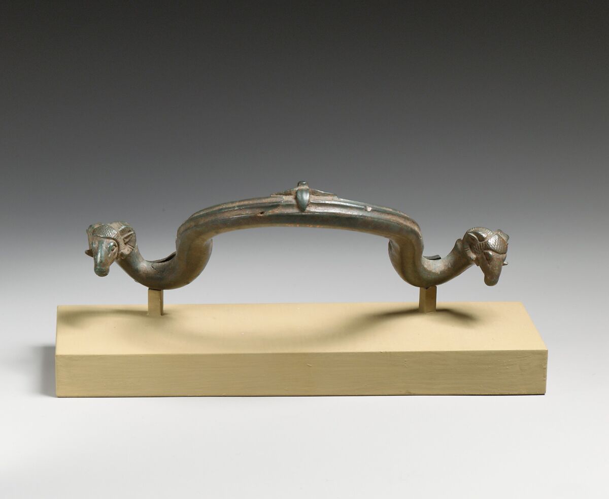 Bronze handle of a bowl or basin, Bronze, Greek 