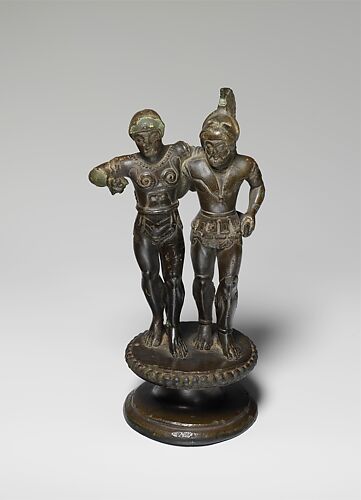 Bronze finial of two warriors from a candelabrum
