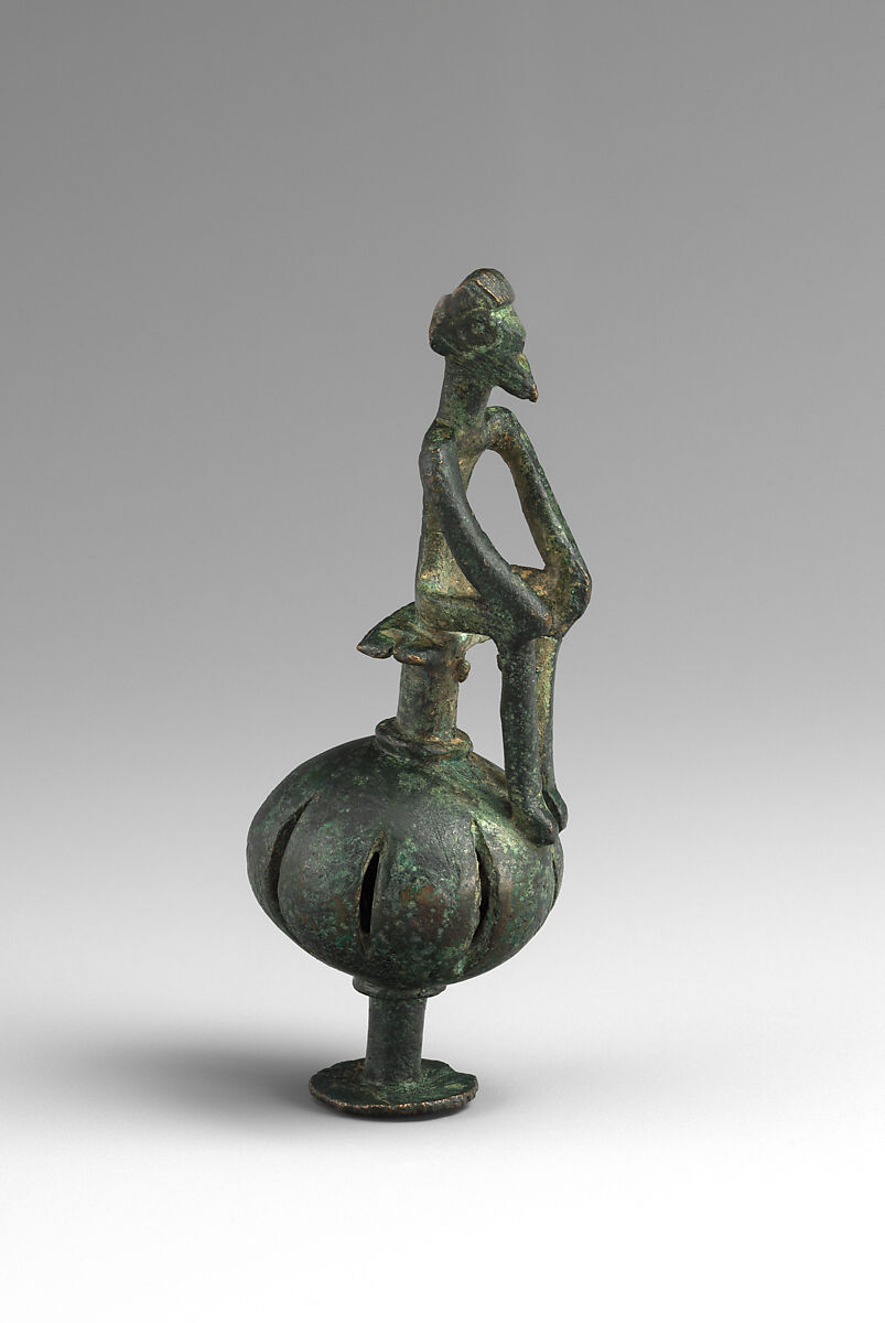 Bronze man seated on a ball, Bronze, Greek