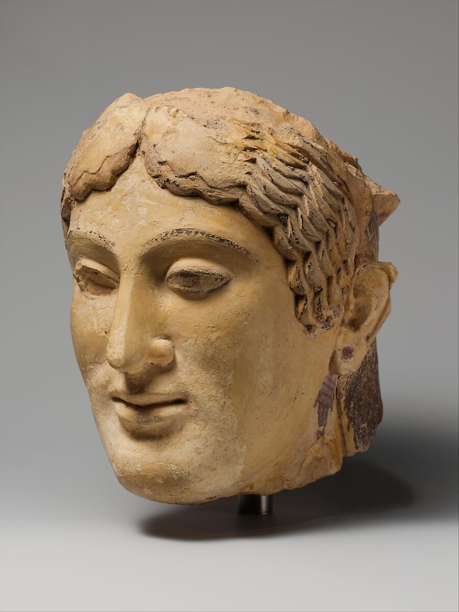 Terracotta head of a woman, probably a sphinx, Terracotta, Greek 