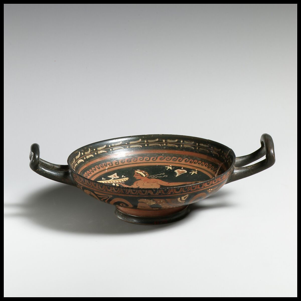 Terracotta stemless kylix (drinking cup), Close in style to the Amphorae Painter, Terracotta, Greek, South Italian, Apulian 