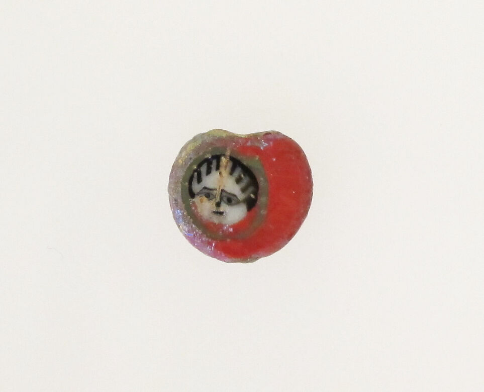 Glass mosaic face bead, Glass, Roman, probably Egyptian