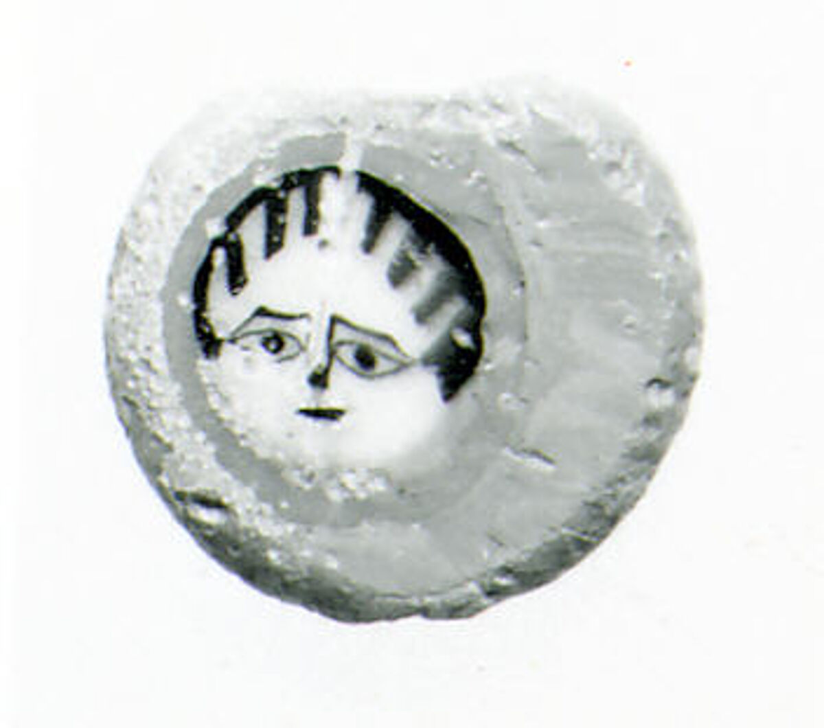 Glass mosaic face bead, Glass, Roman, probably Egyptian