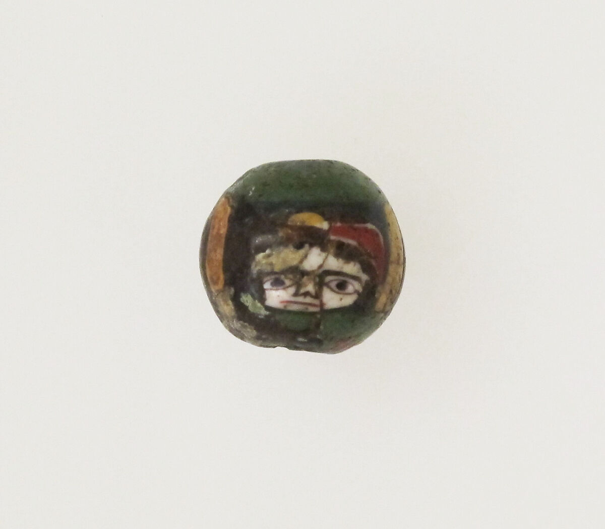 Glass mosaic face bead, Glass, Roman, Egyptian 