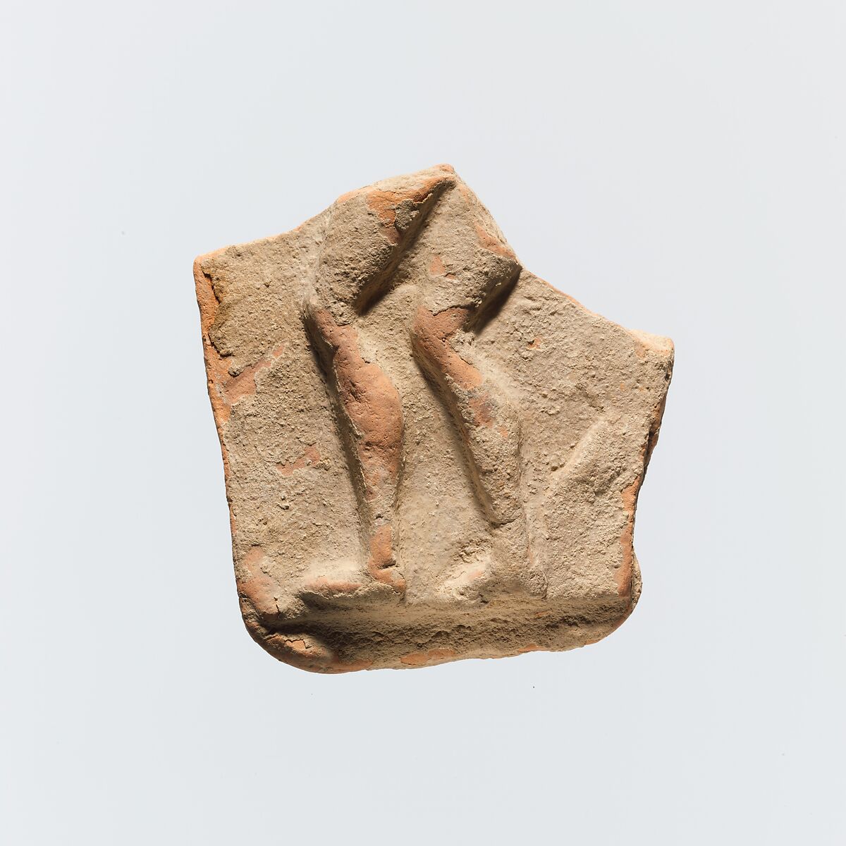 Fragment of a terracotta plaque, Terracotta, Greek, Cretan 