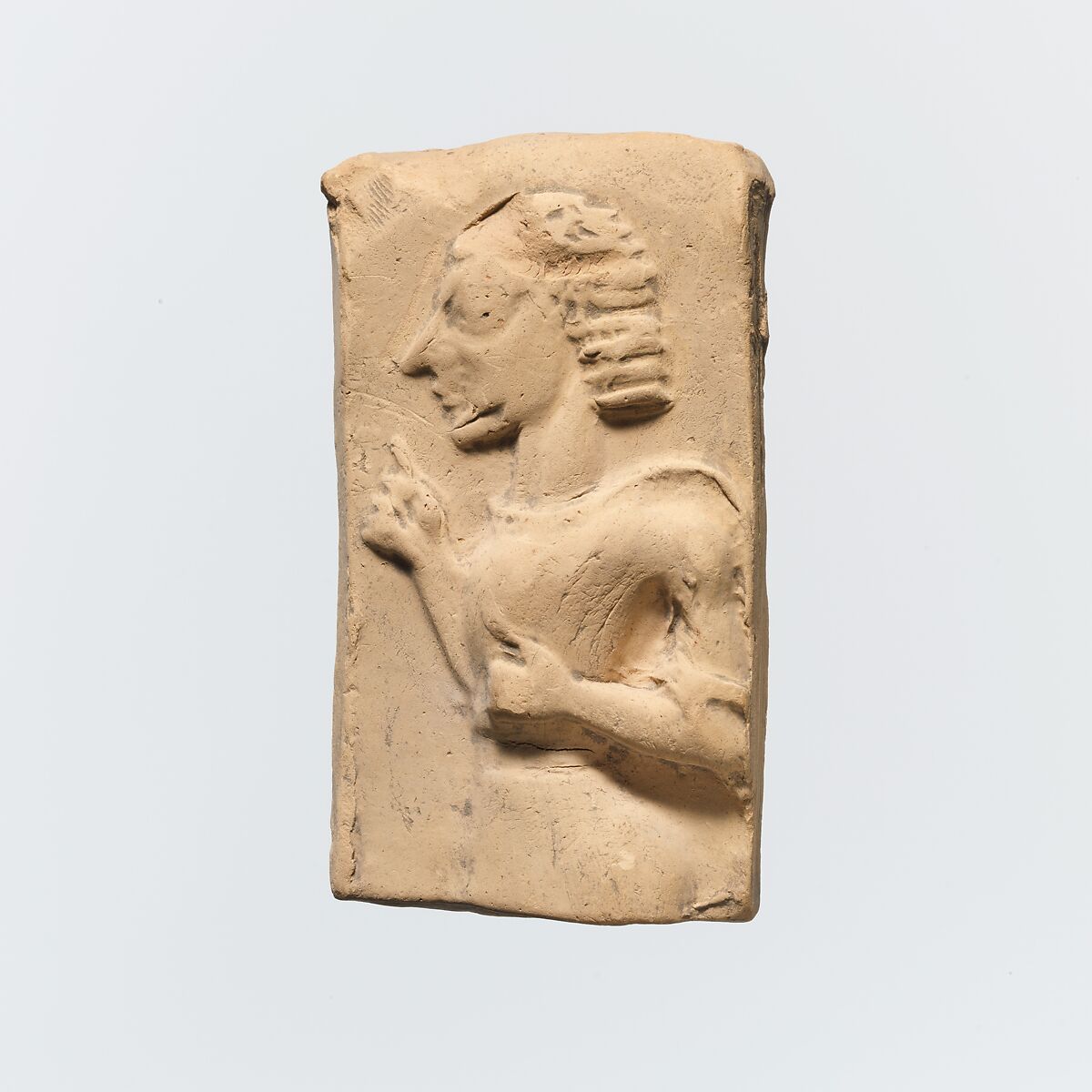 Fragment of a terracotta plaque, Terracotta, Greek, Cretan 