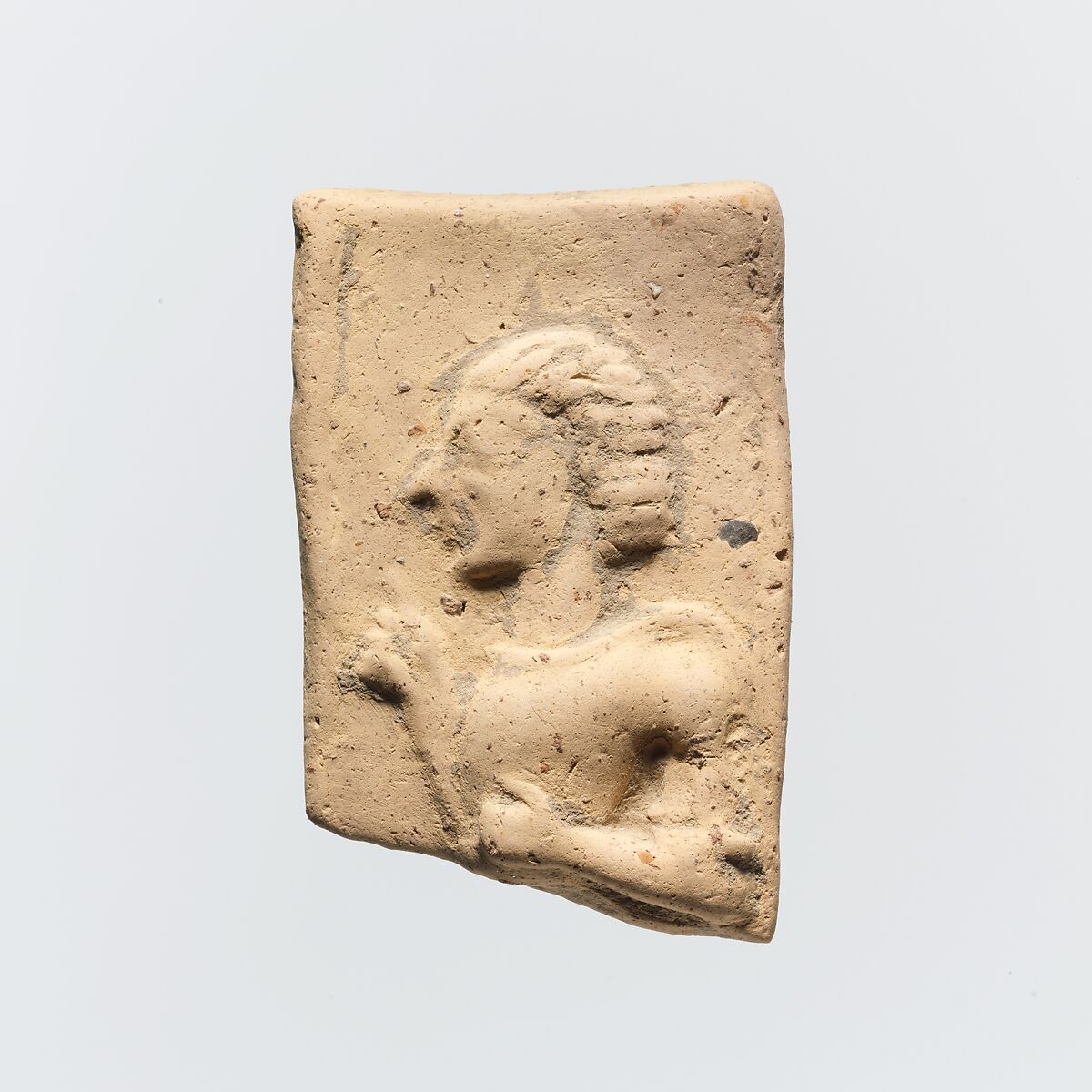 Fragment of a terracotta plaque, Terracotta, Greek, Cretan 