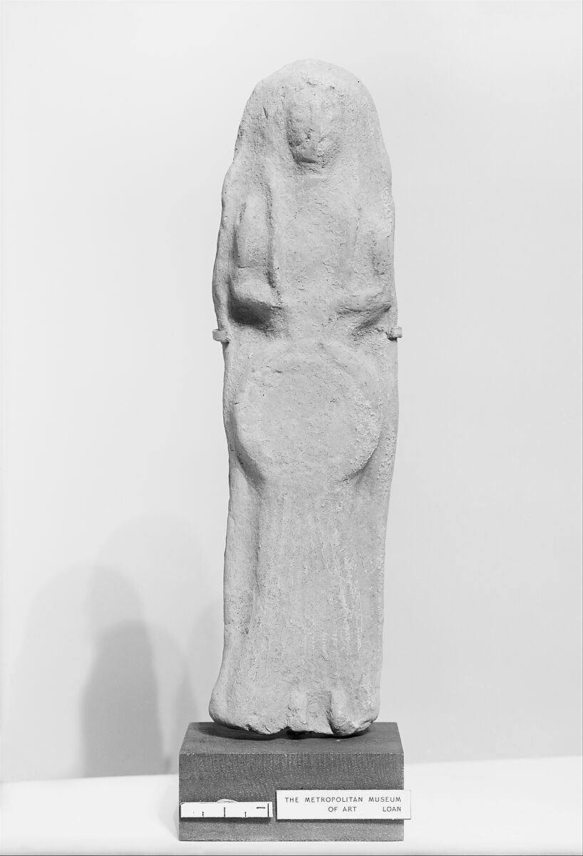 Terracotta plaque with a female figure holding a tympanum, Terracotta, Greek, Cretan 