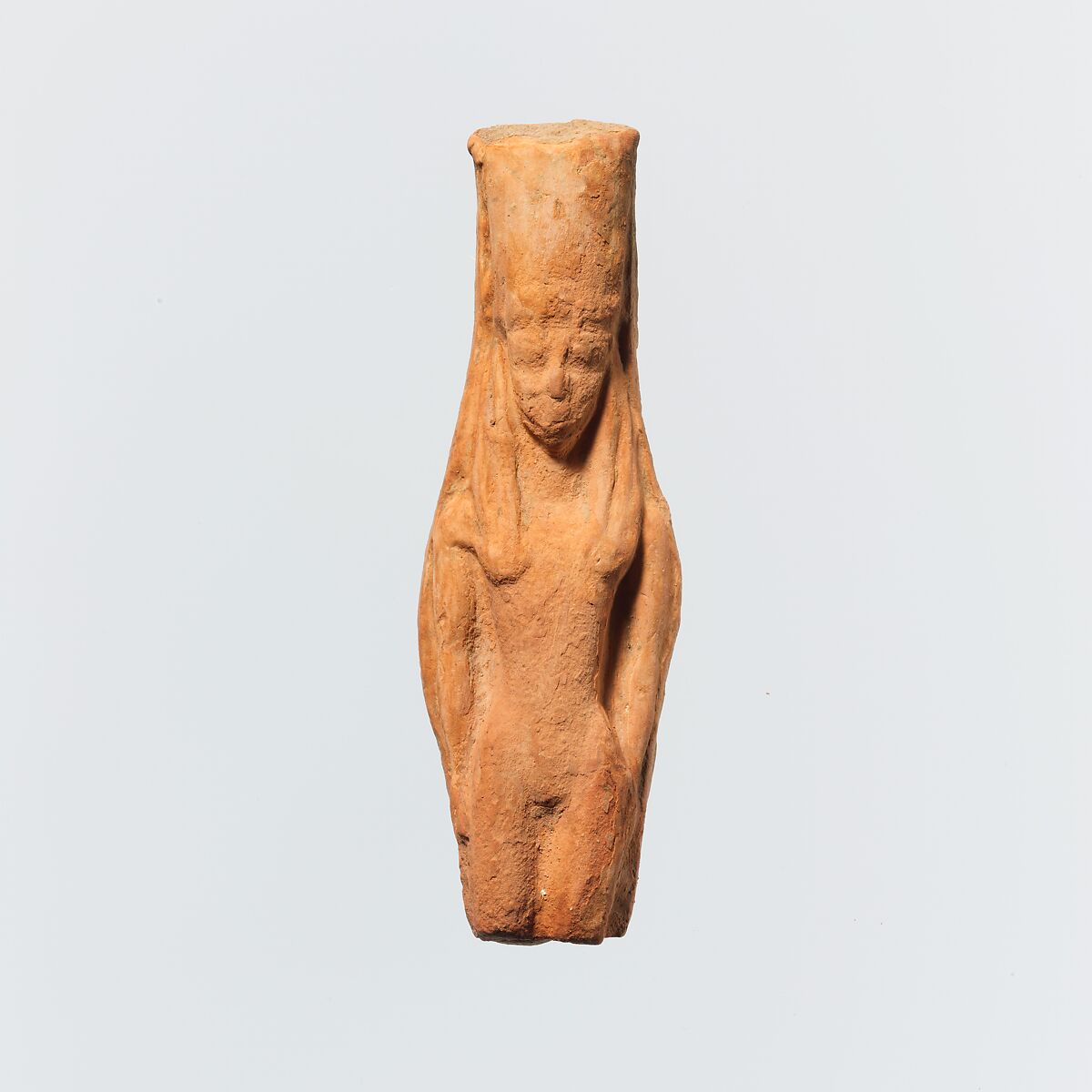 Terracotta statuette of a female figure, Terracotta, Greek, Cretan 